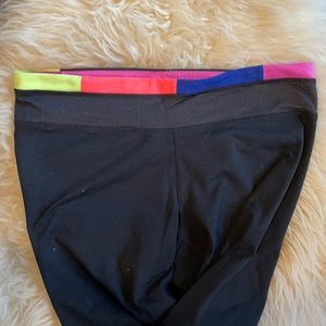 Black and neon UA leggings